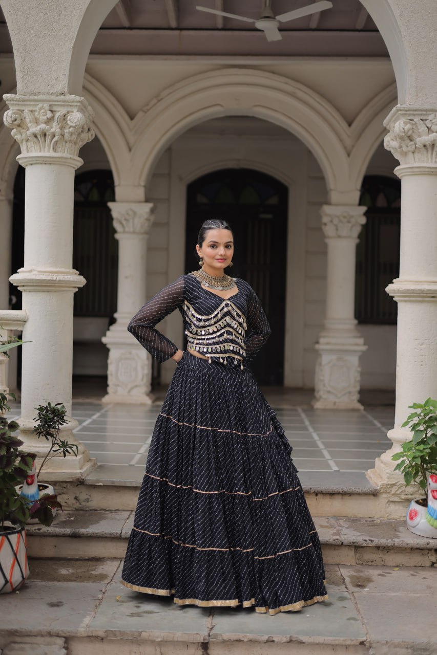 Black Navratri Special Leheriya Print Lehenga Choli with 12 Mtr Flair & Mirror Lace Work ClothsVilla