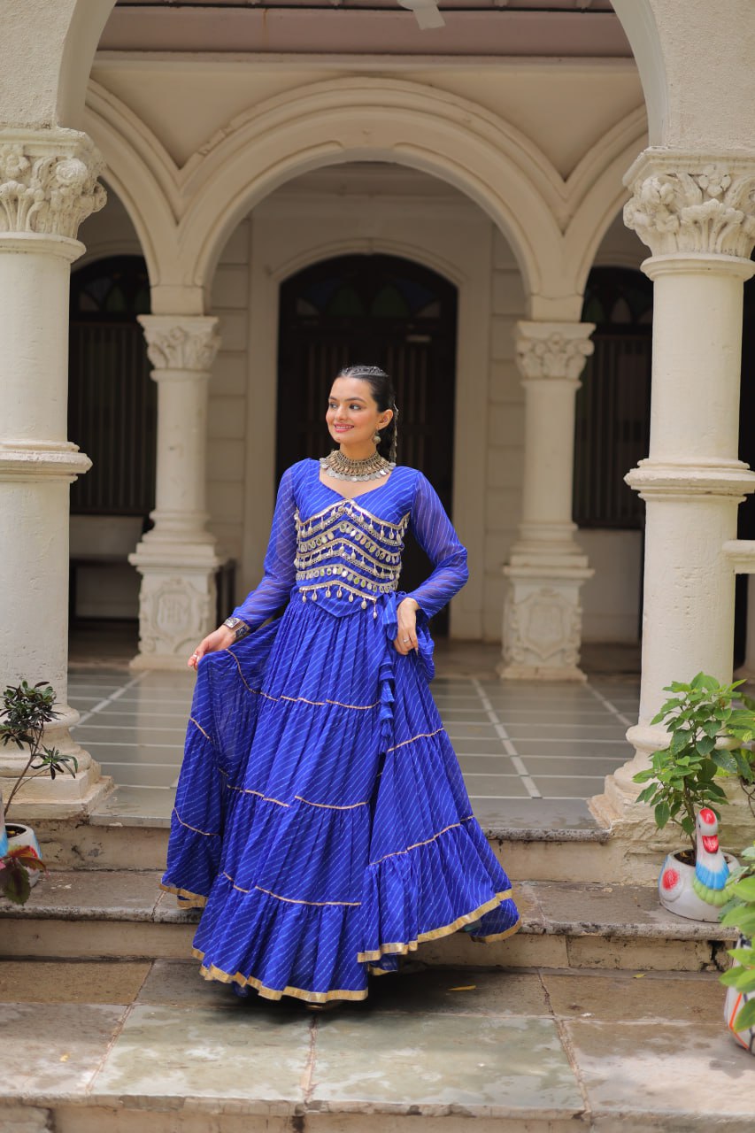 Blue Navratri Special Leheriya Print Lehenga Choli with 12 Mtr Flair & Mirror Lace Work ClothsVilla