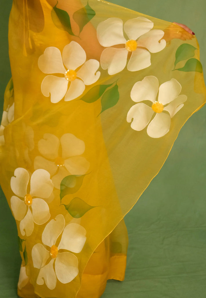 Sunshine Yellow Pure Organza Saree with Hand-Painted White Floral Motifs & Sequin Embellishments FANCY SAREES