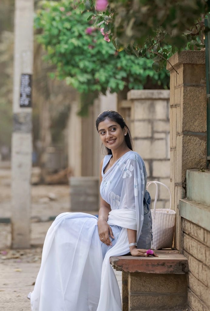 Sky Blue Pure Georgette Hand-Painted Saree with White Floral Motifs and Sequins | Modal Satin Blouse FANCY SAREES