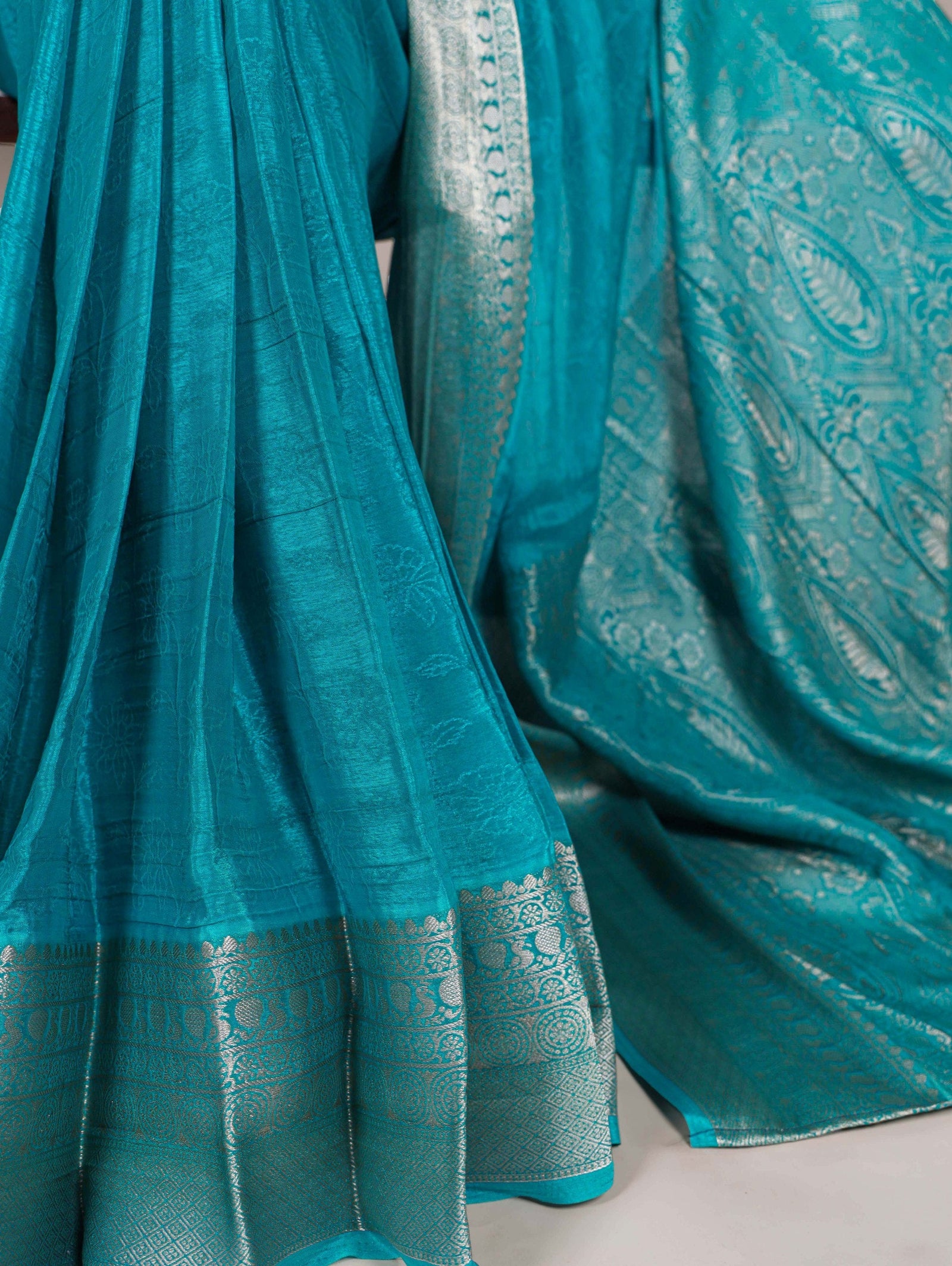 Firozi Elegant Chinon Saree with Self Print & Zari Weaving Work Unstitched Blouse Included ClothsVilla