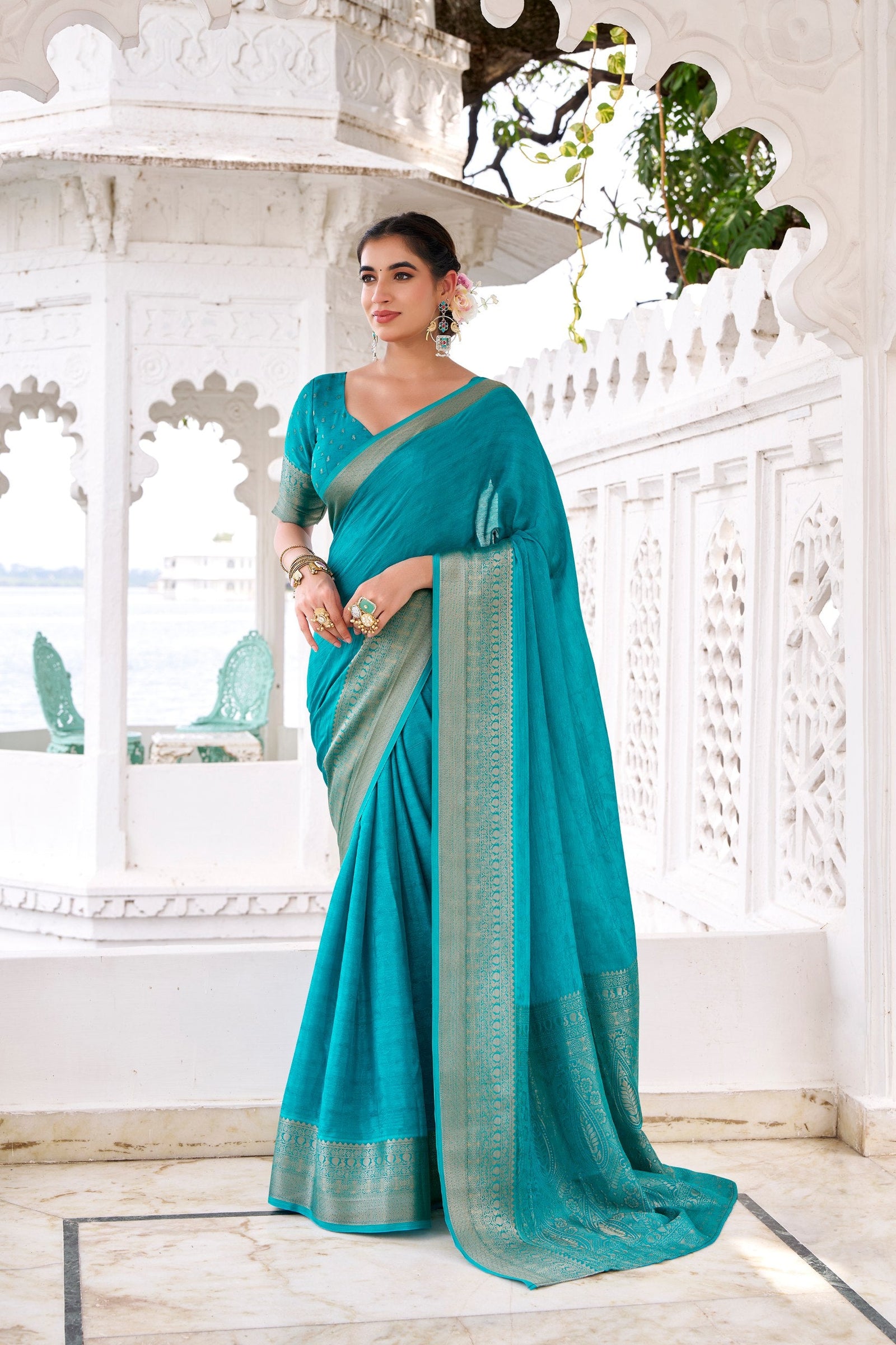 Firozi Elegant Chinon Saree with Self Print & Zari Weaving Work Unstitched Blouse Included ClothsVilla