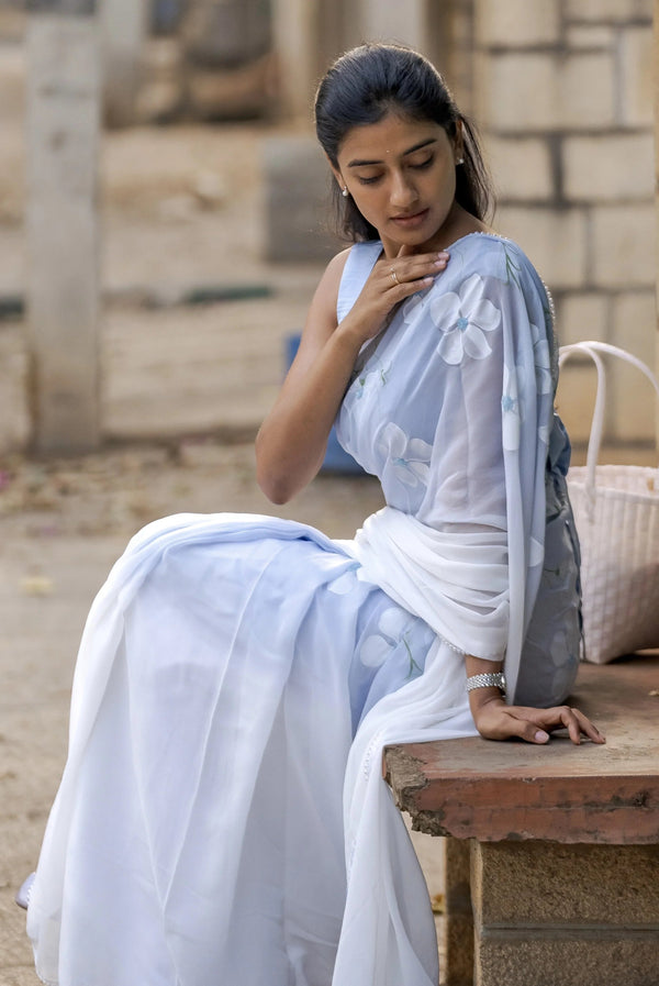 Sky Blue Pure Georgette Hand-Painted Saree with White Floral Motifs and Sequins | Modal Satin Blouse FANCY SAREES
