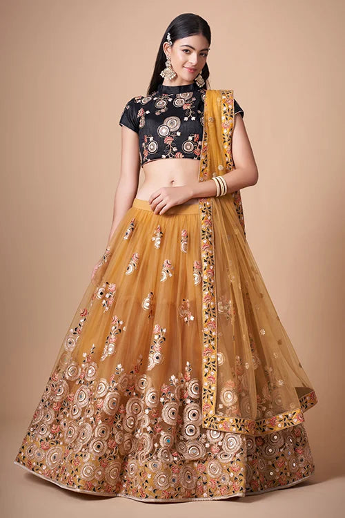 Gold Color Exquisite Soft Net Embellished Lehenga Choli For Festive Fervor Clothsvilla