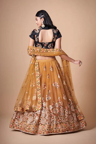 Gold Color Exquisite Soft Net Embellished Lehenga Choli For Festive Fervor Clothsvilla