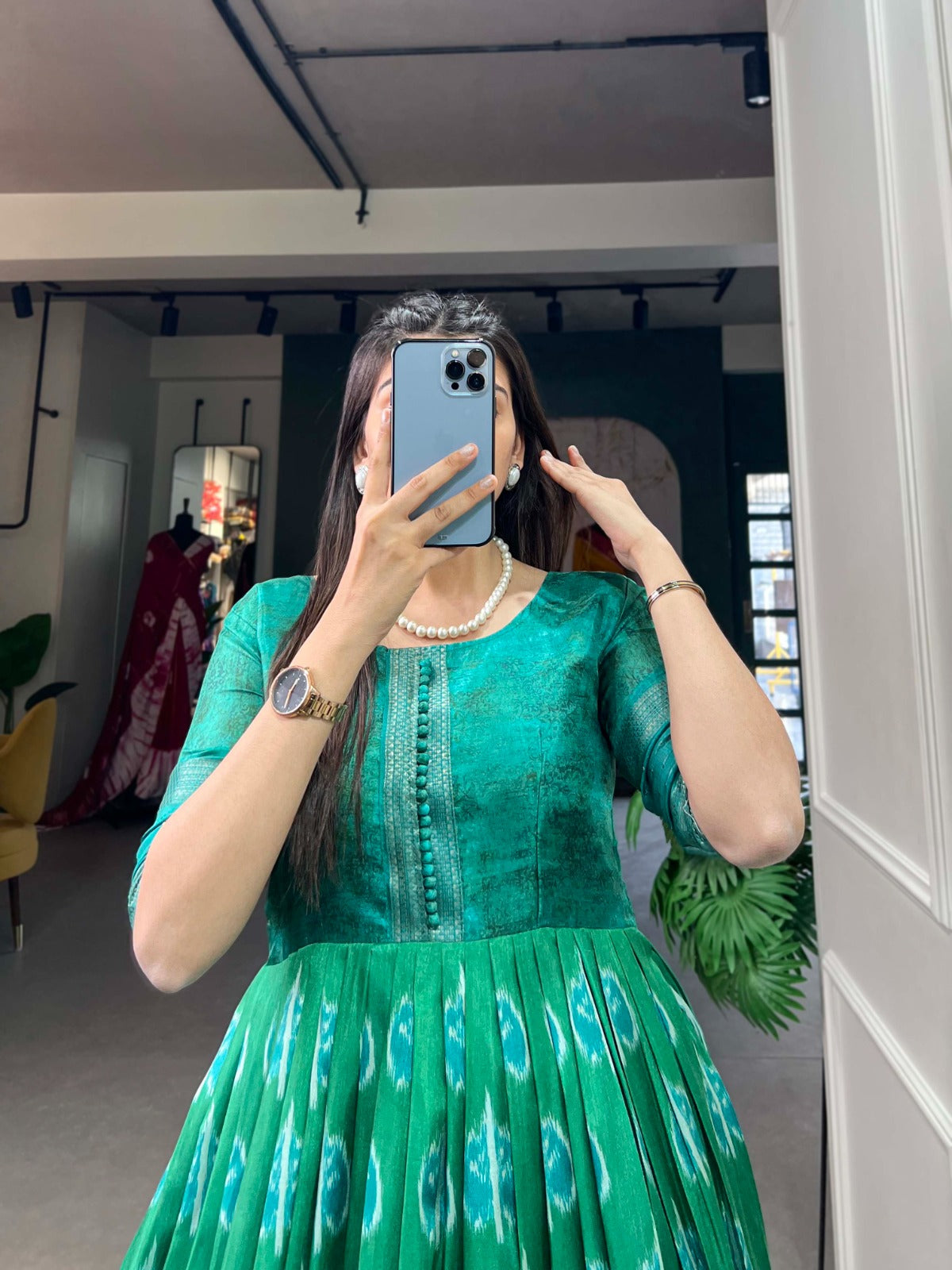 Green Color Dola Silk Printed Gown with Exquisite Zari Border ClothsVilla
