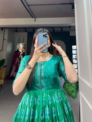 Green Color Dola Silk Printed Gown with Exquisite Zari Border ClothsVilla