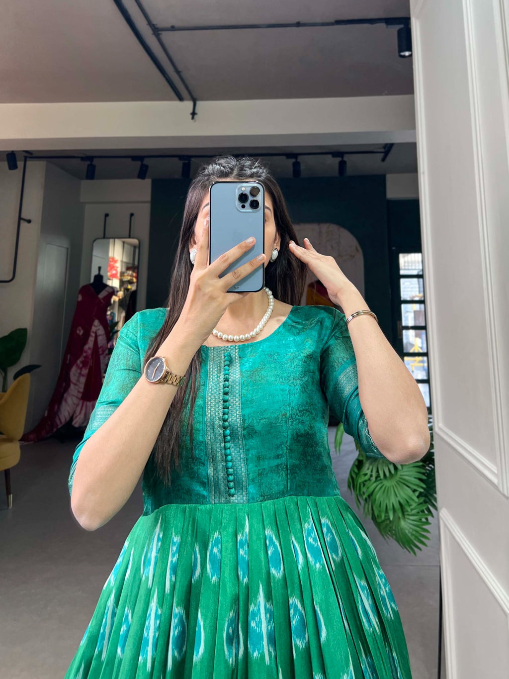Green Color Dola Silk Printed Gown with Exquisite Zari Border ClothsVilla