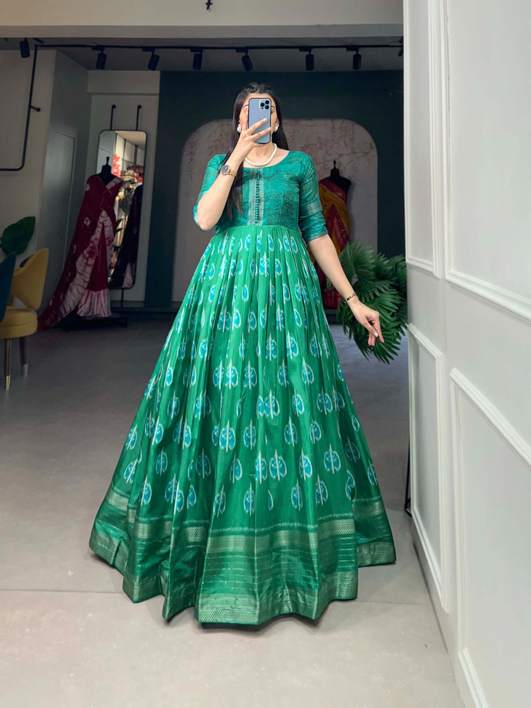 Green Color Dola Silk Printed Gown with Exquisite Zari Border ClothsVilla