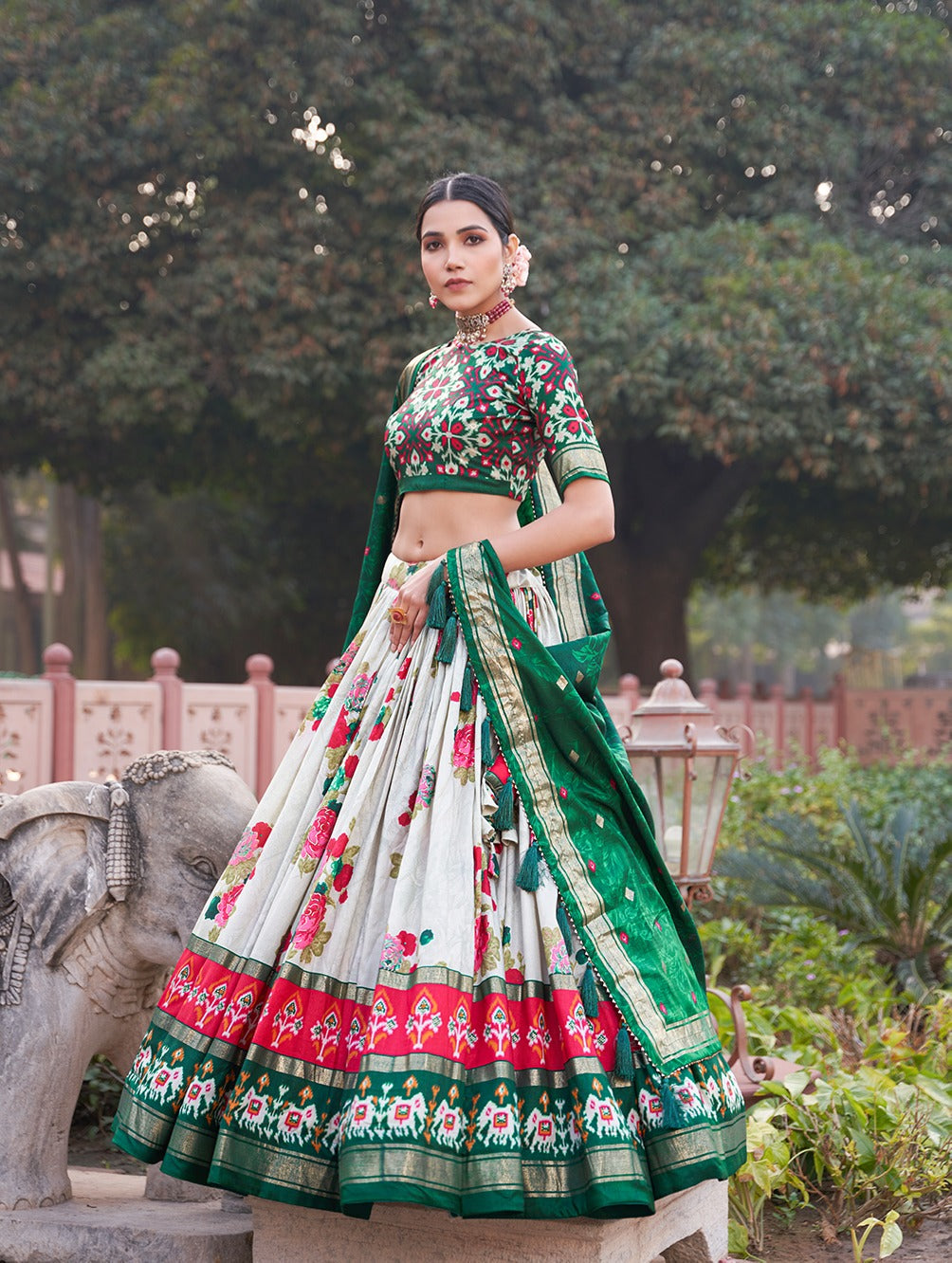 Green Dola Silk Lehenga Choli with Floral & Patola Print ClothsVilla