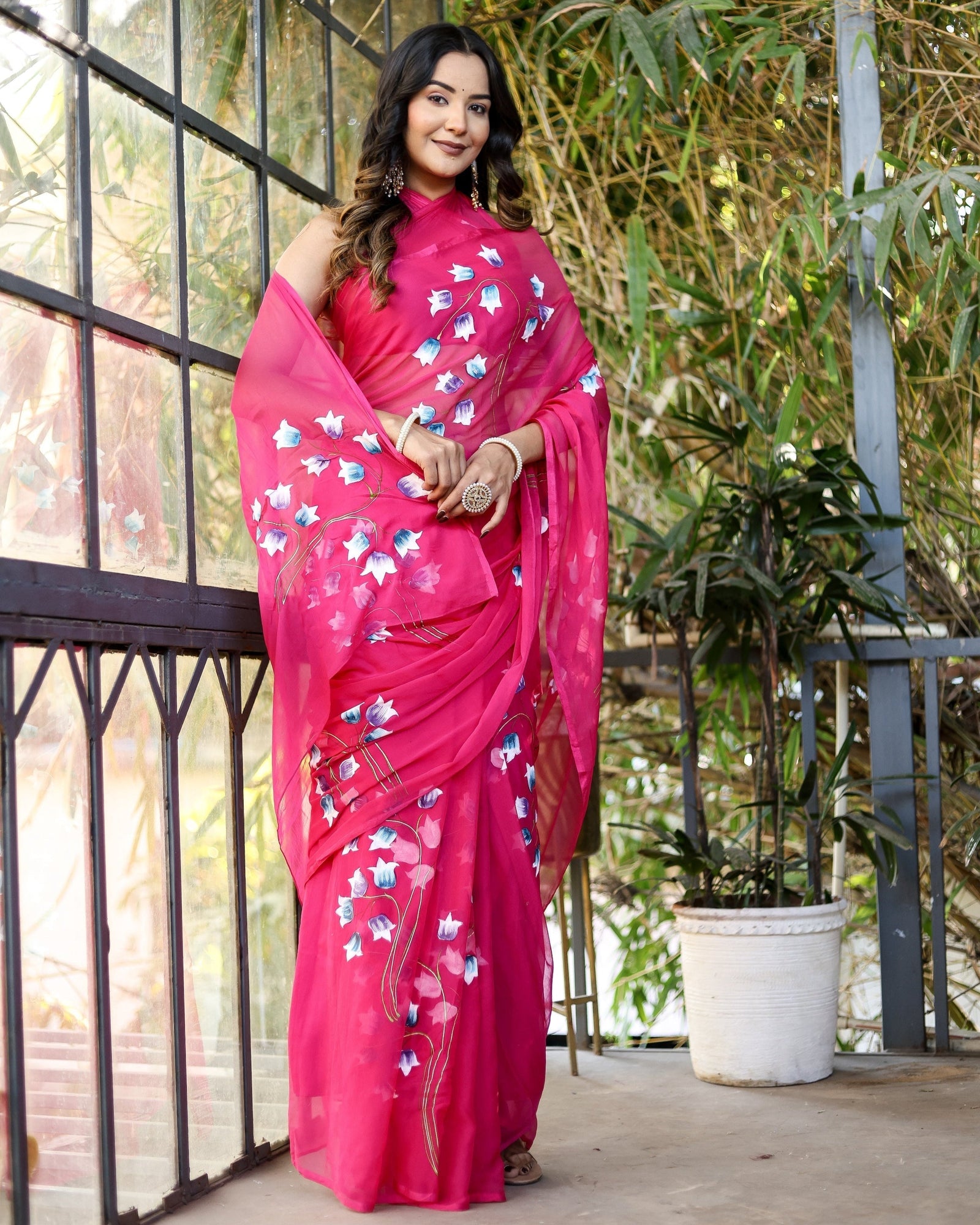 Rani Pink Georgette Saree with Hand-Painted Blue & White Bell Flowers – Attached Blouse – 5.5 Meters FANCY SAREES