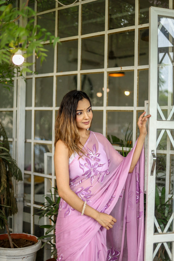 Lavender Georgette Saree with Hand-Painted Purple Floral Motifs & Pearl Highlights – Attached Blouse – 5.5 Meters FANCY SAREES