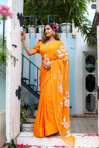 Sunset Orange Georgette Saree with Hand-Painted White Floral Motifs – Attached Blouse – 5.5 Meters FANCY SAREES