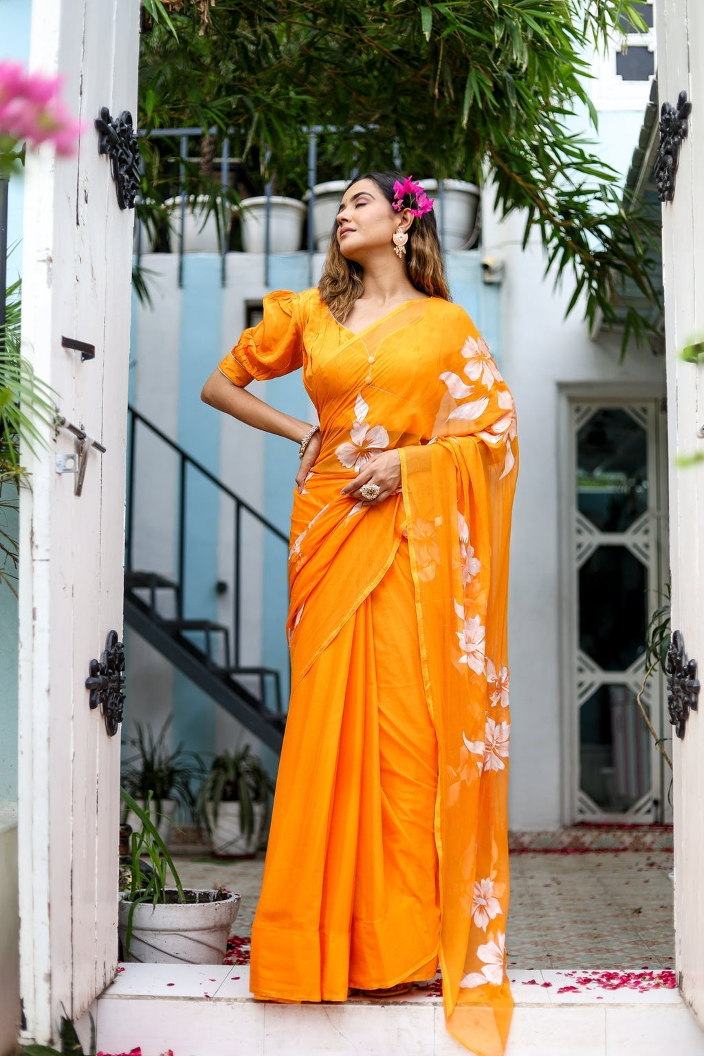 Sunset Orange Georgette Saree with Hand-Painted White Floral Motifs – Attached Blouse – 5.5 Meters FANCY SAREES