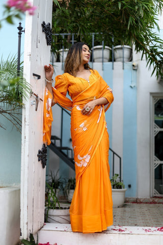 Sunset Orange Georgette Saree with Hand-Painted White Floral Motifs – Attached Blouse – 5.5 Meters FANCY SAREES