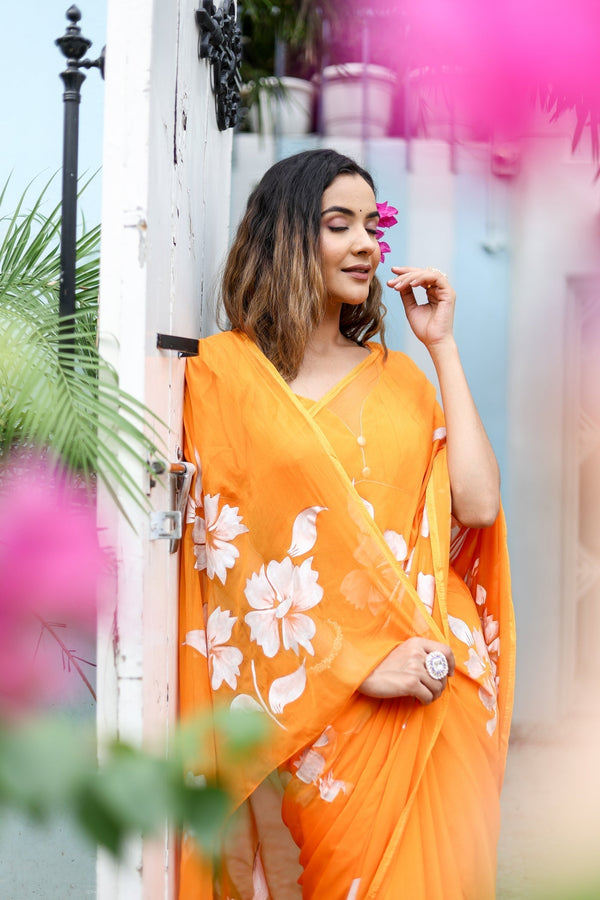 Sunset Orange Georgette Saree with Hand-Painted White Floral Motifs – Attached Blouse – 5.5 Meters FANCY SAREES