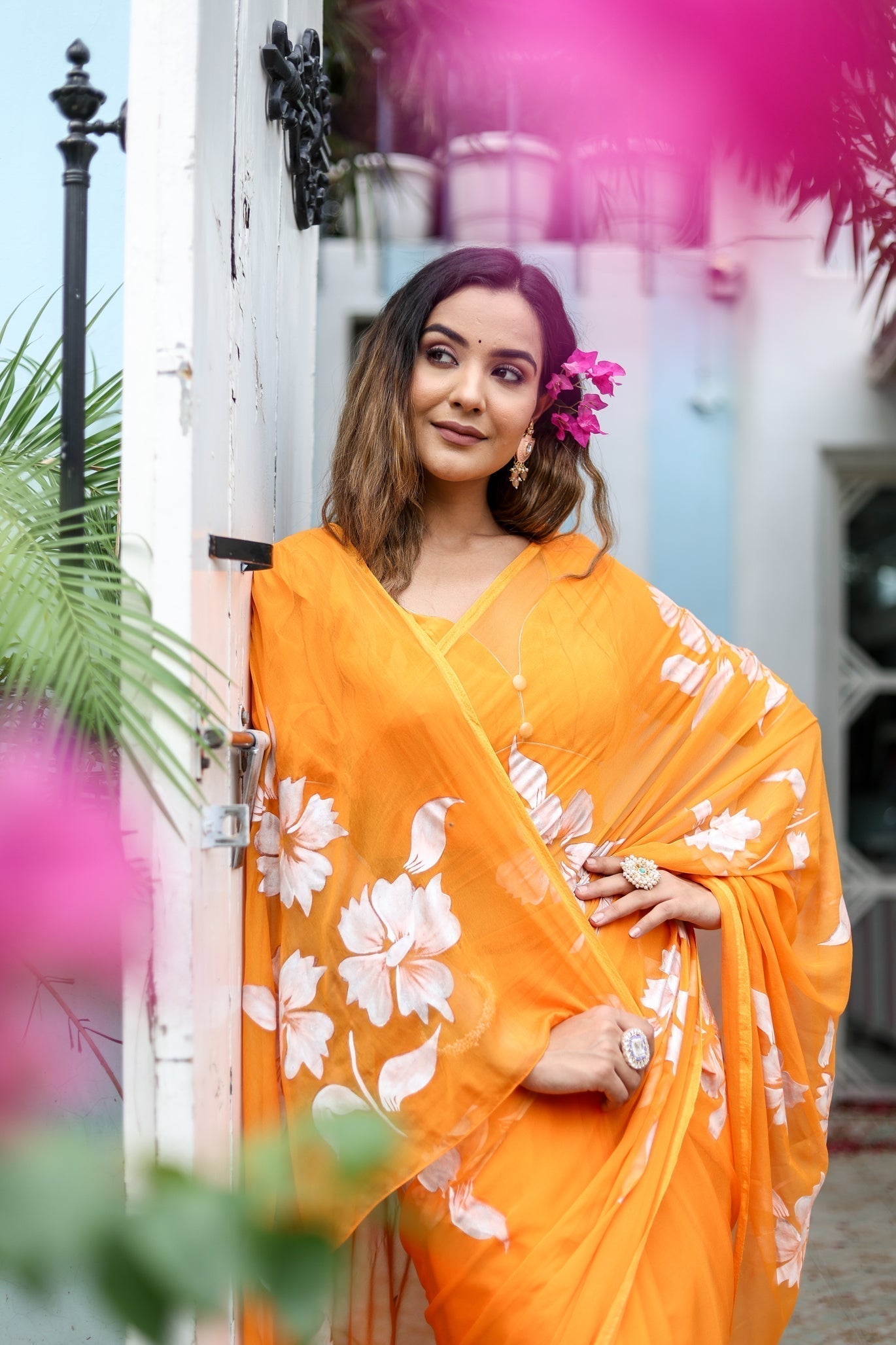 Sunset Orange Georgette Saree with Hand-Painted White Floral Motifs – Attached Blouse – 5.5 Meters FANCY SAREES