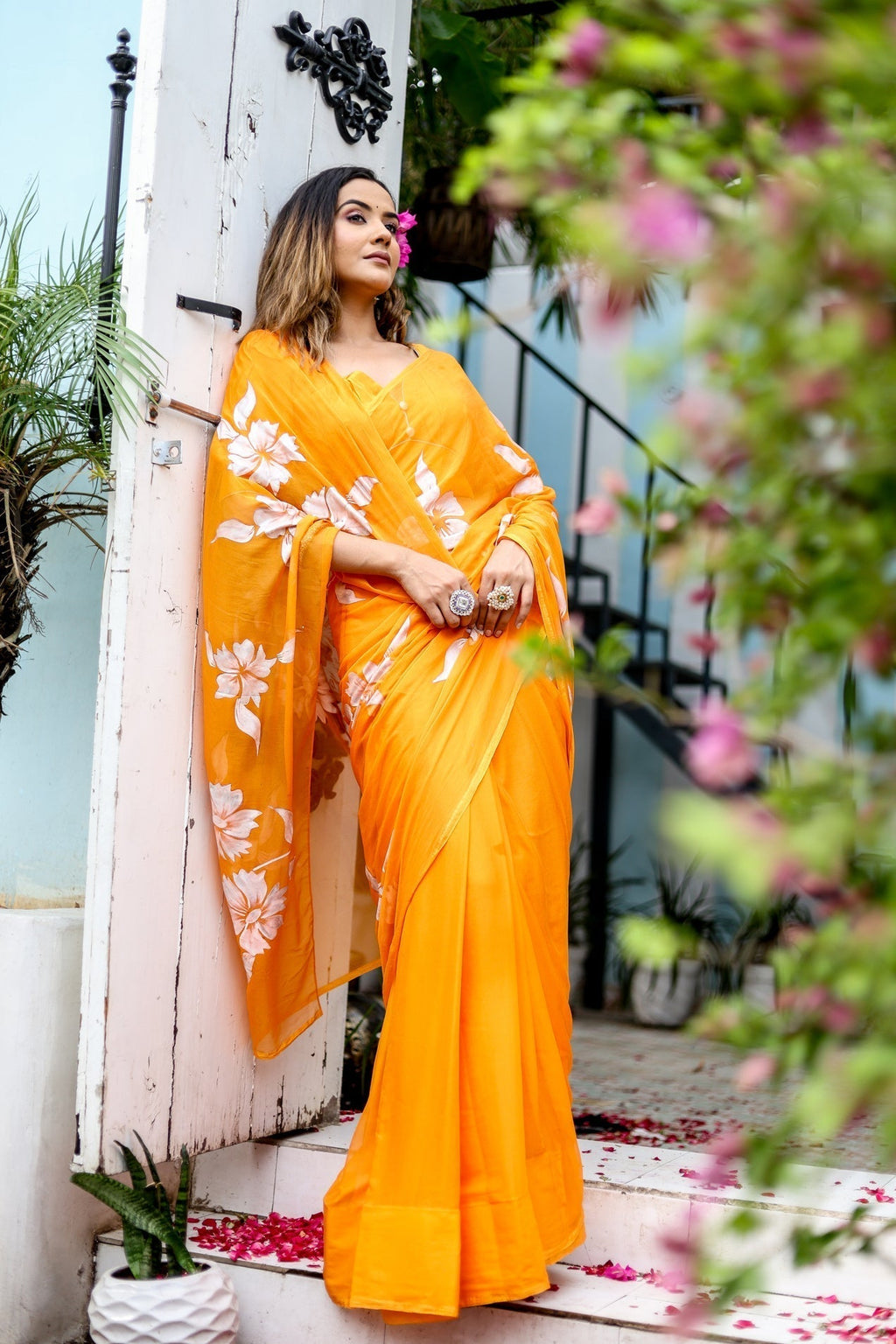 Sunset Orange Georgette Saree with Hand-Painted White Floral Motifs – Attached Blouse – 5.5 Meters FANCY SAREES