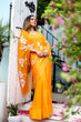 Load image into Gallery viewer, Sunset Orange Georgette Saree with Hand-Painted White Floral Motifs – Attached Blouse – 5.5 Meters FANCY SAREES