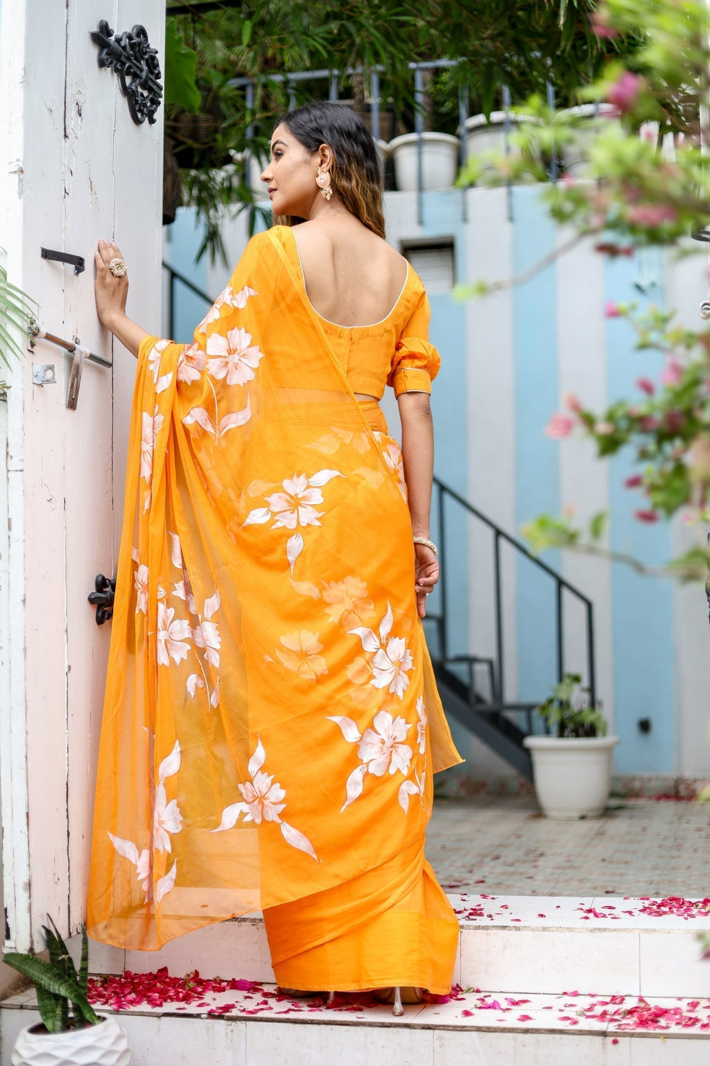 Sunset Orange Georgette Saree with Hand-Painted White Floral Motifs – Attached Blouse – 5.5 Meters FANCY SAREES