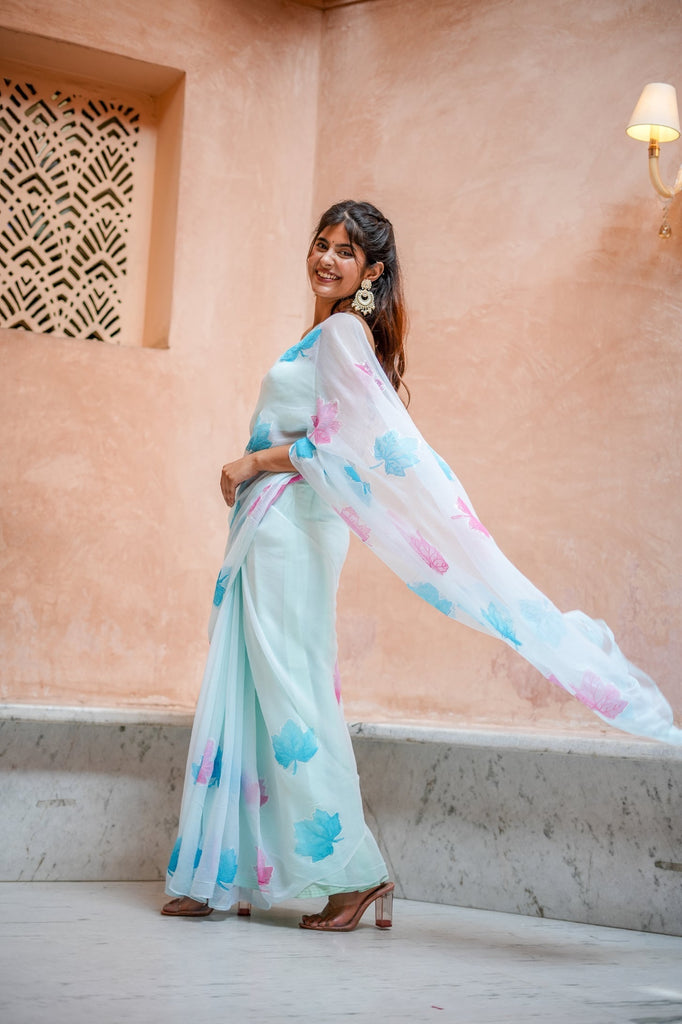 Sky Blue Georgette Saree with Embroidered Pink & Blue Leaf Motifs – Attached Blouse – 5.5 Meters FANCY SAREES