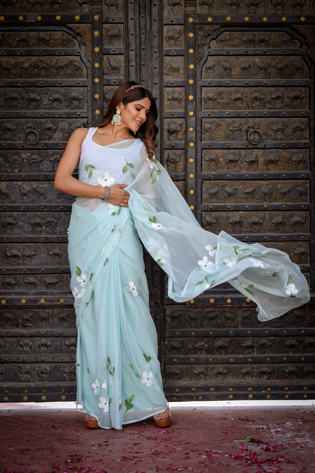 Pastel Blue Georgette Saree with Hand-Painted White Floral Motifs & Green Leaves – Attached Blouse – 5.5 Meters FANCY SAREES