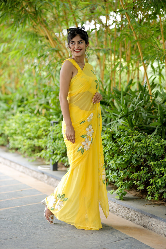Sunshine Yellow Georgette Saree with Hand-Painted White Floral Motifs – Attached Blouse – 5.5 Meters FANCY SAREES