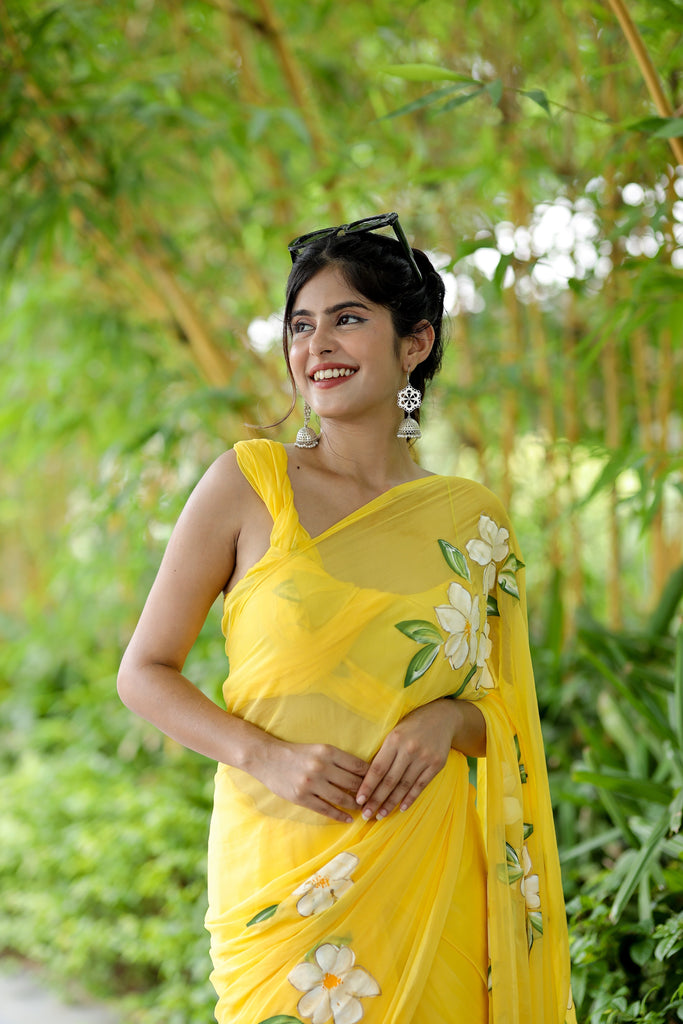 Sunshine Yellow Georgette Saree with Hand-Painted White Floral Motifs – Attached Blouse – 5.5 Meters FANCY SAREES