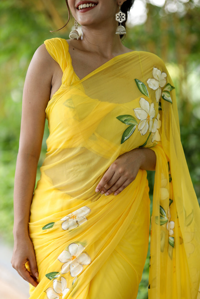 Sunshine Yellow Georgette Saree with Hand-Painted White Floral Motifs – Attached Blouse – 5.5 Meters FANCY SAREES