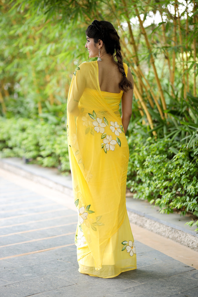 Sunshine Yellow Georgette Saree with Hand-Painted White Floral Motifs – Attached Blouse – 5.5 Meters FANCY SAREES