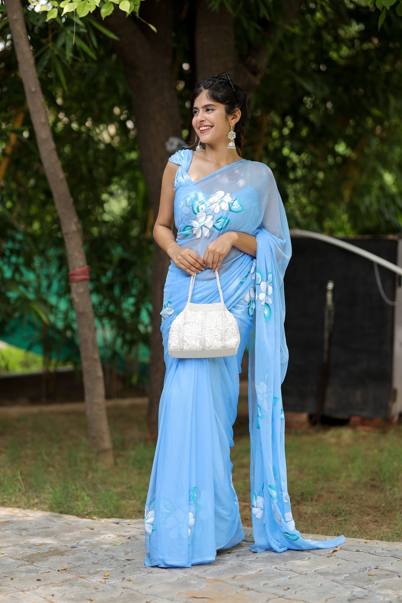 Sky Blue Georgette Saree with Hand-Painted White Floral Motifs – Attached Blouse – 5.5 Meters FANCY SAREES