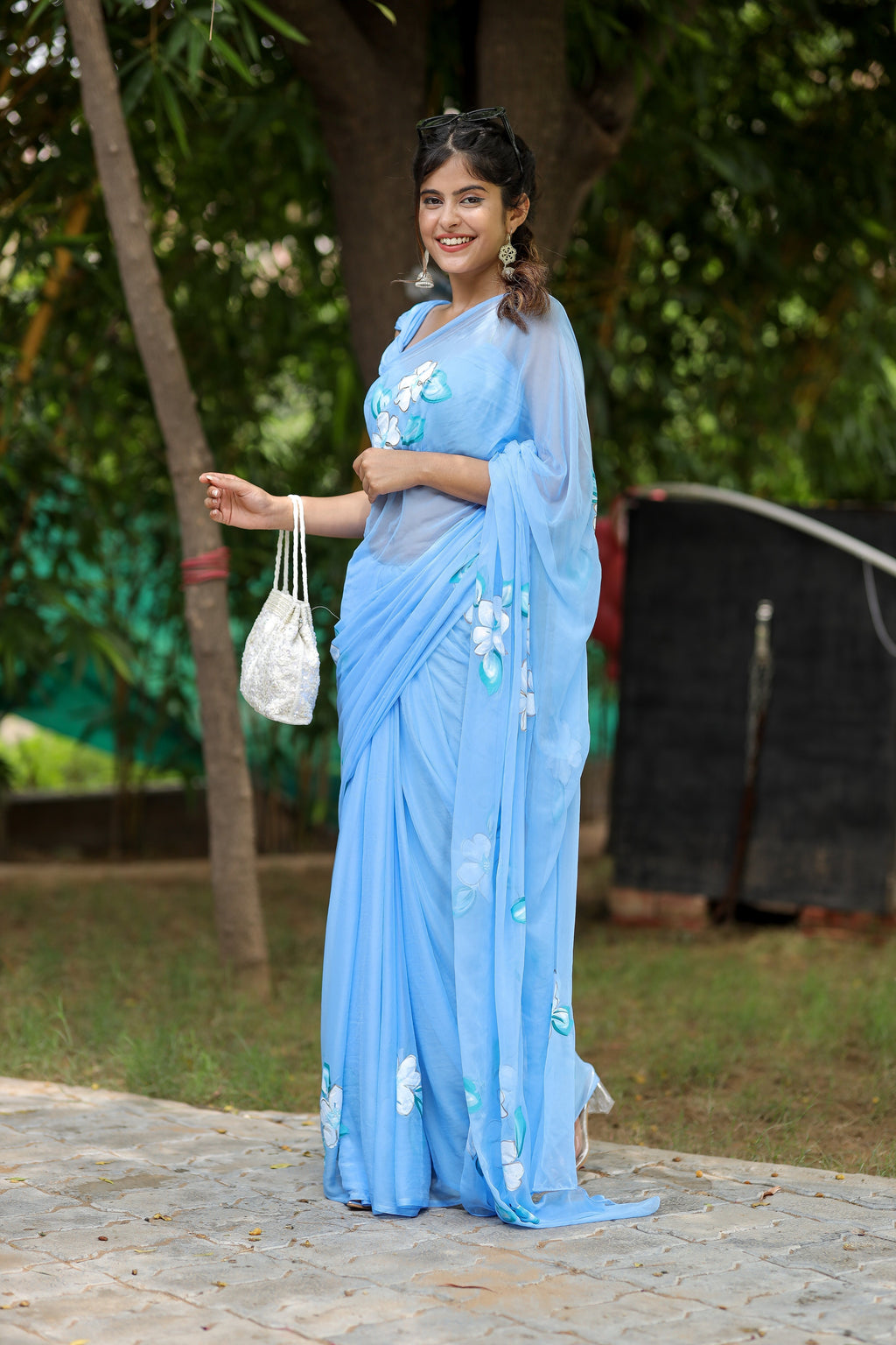 Sky Blue Georgette Saree with Hand-Painted White Floral Motifs – Attached Blouse – 5.5 Meters FANCY SAREES