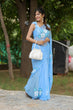Load image into Gallery viewer, Sky Blue Georgette Saree with Hand-Painted White Floral Motifs – Attached Blouse – 5.5 Meters FANCY SAREES