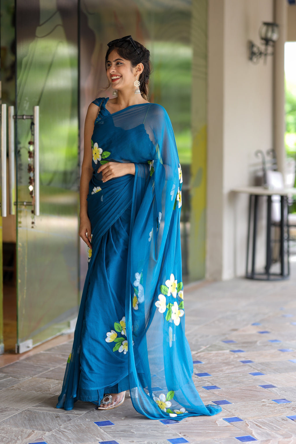 Teal Blue Georgette Saree with Hand-Painted Yellow & White Floral Motifs – Attached Blouse – 5.5 Meters FANCY SAREES