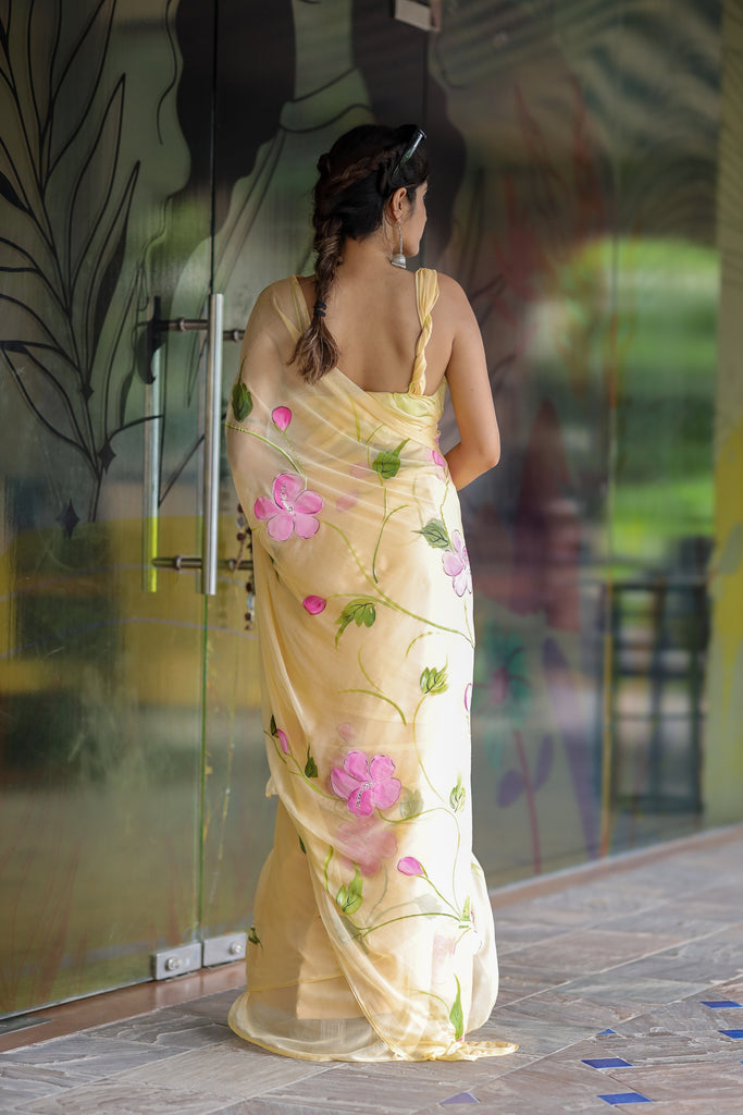 Butter Yellow Georgette Saree with Hand-Painted Pink Floral Vines – Attached Blouse – 5.5 Meters FANCY SAREES