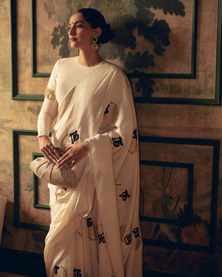 SONAM KAPOOR In Cream Satin Georgette Saree with Golden and Black Calligraphy Print FANCY SAREES