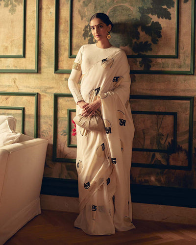 SONAM KAPOOR In Cream Satin Georgette Saree with Golden and Black Calligraphy Print FANCY SAREES
