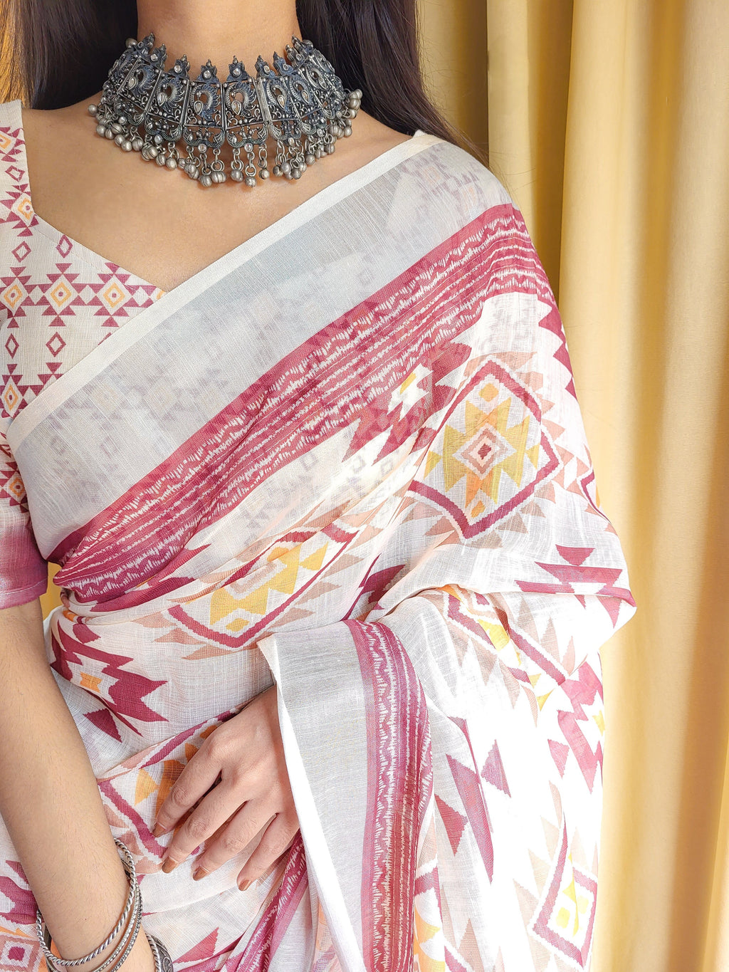 Ivory Linen Saree with Geometric Tribal Prints & Tassel Accents LINEN