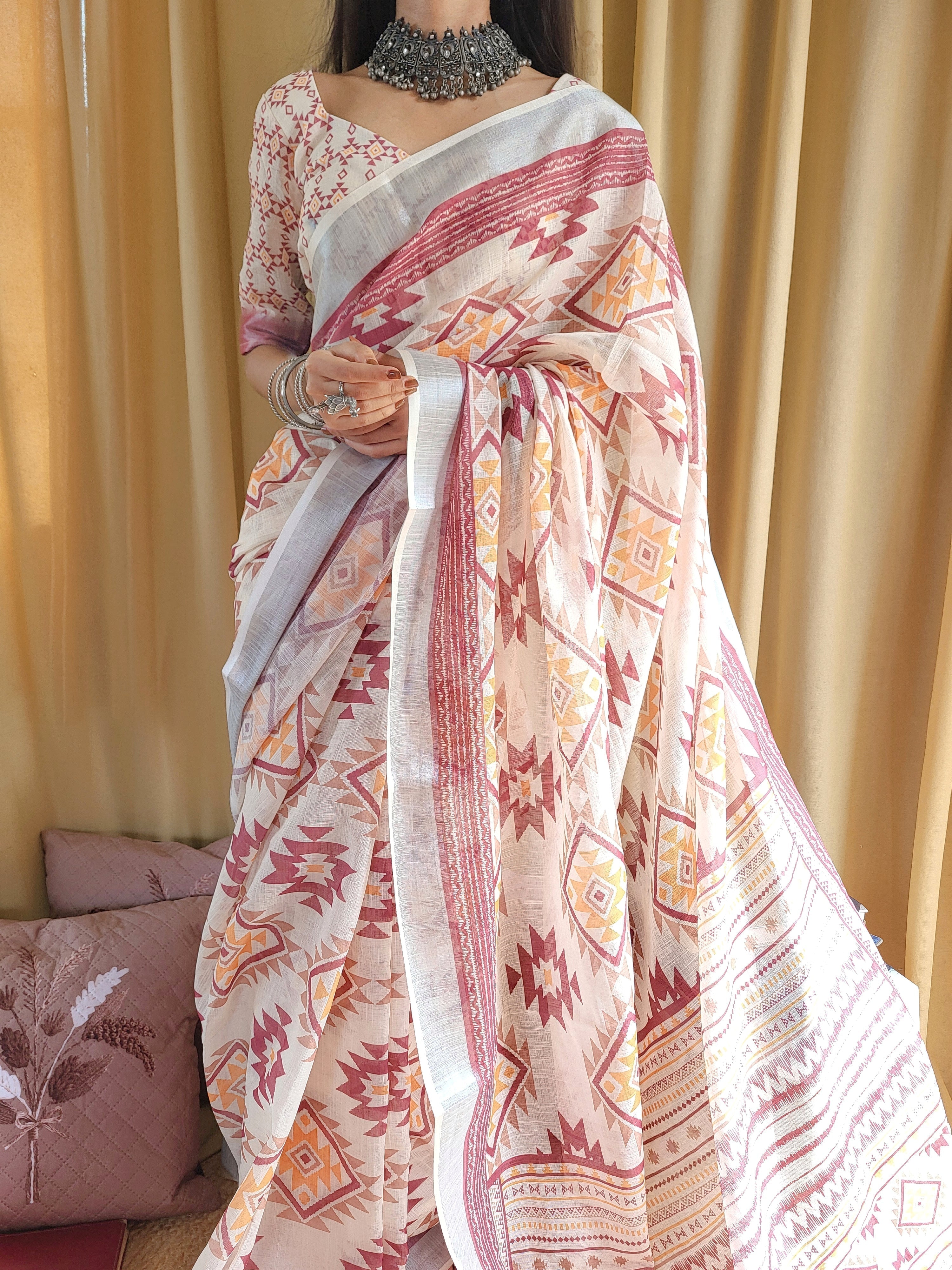 Ivory Linen Saree with Geometric Tribal Prints & Tassel Accents LINEN