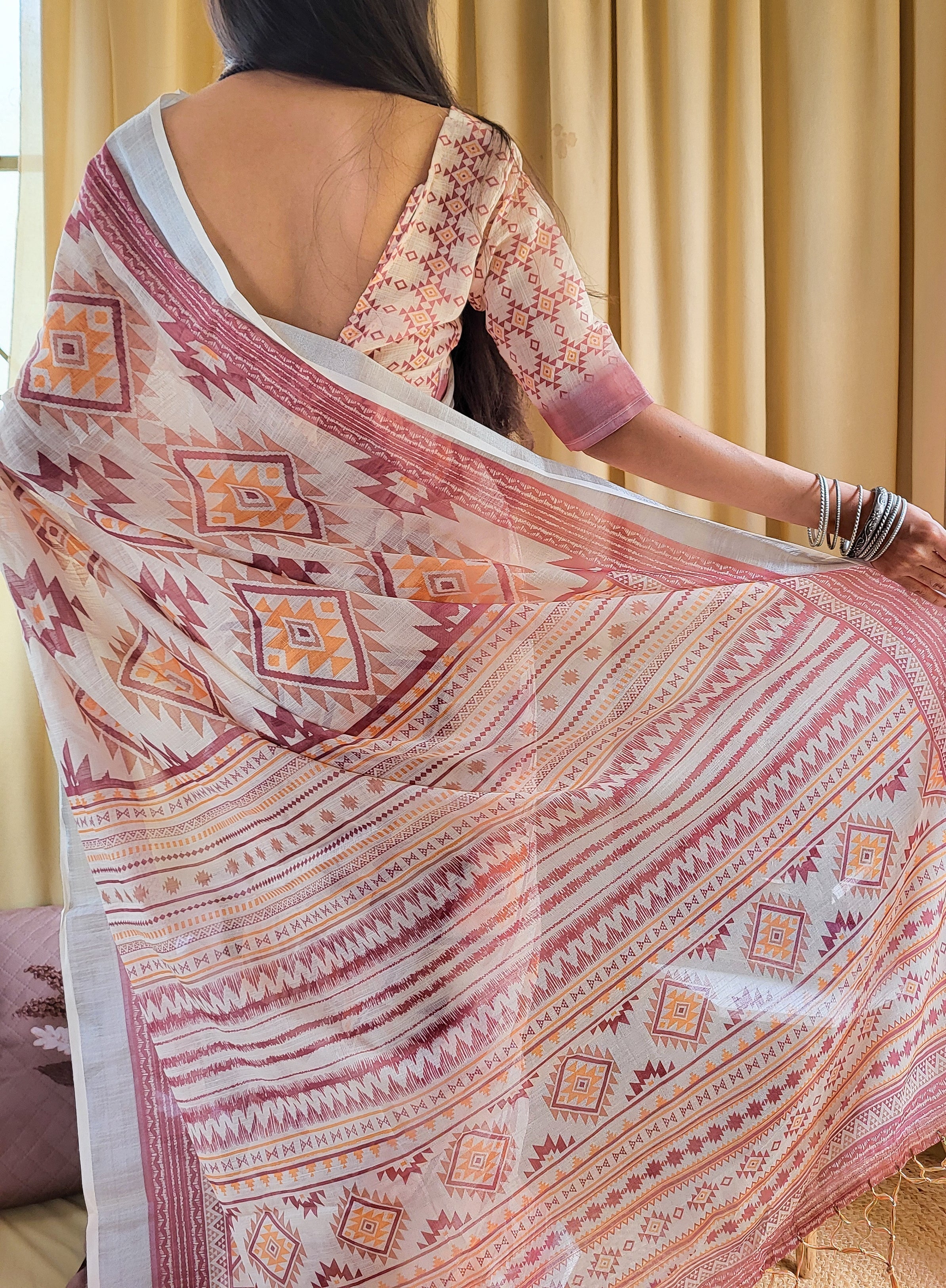 Ivory Linen Saree with Geometric Tribal Prints & Tassel Accents LINEN