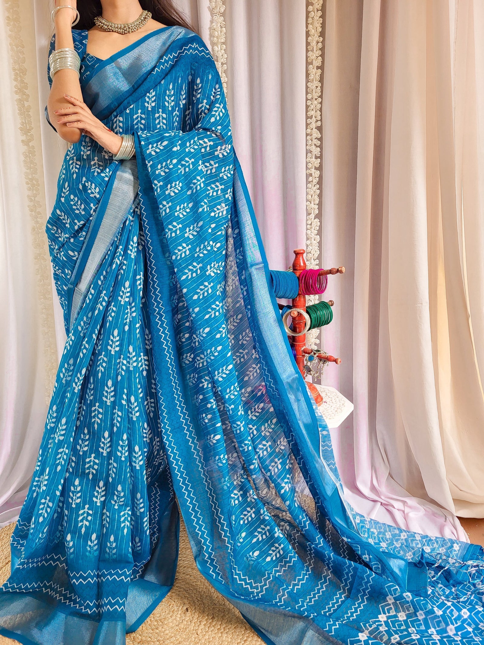Elegant Blue Pure Linen Saree with Tassels and White Floral Patterns LINEN