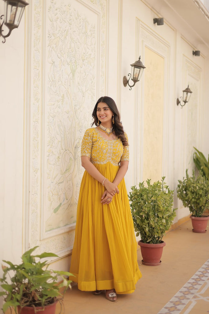 Luxurious Zari-Embroidered Yellow Gown for Discerning Women ClothsVilla