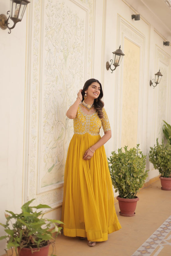 Luxurious Zari-Embroidered Yellow Gown for Discerning Women ClothsVilla