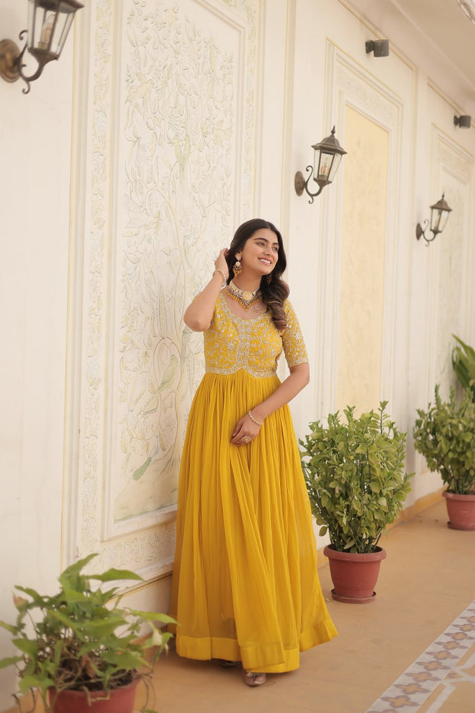 Luxurious Zari-Embroidered Yellow Gown for Discerning Women ClothsVilla