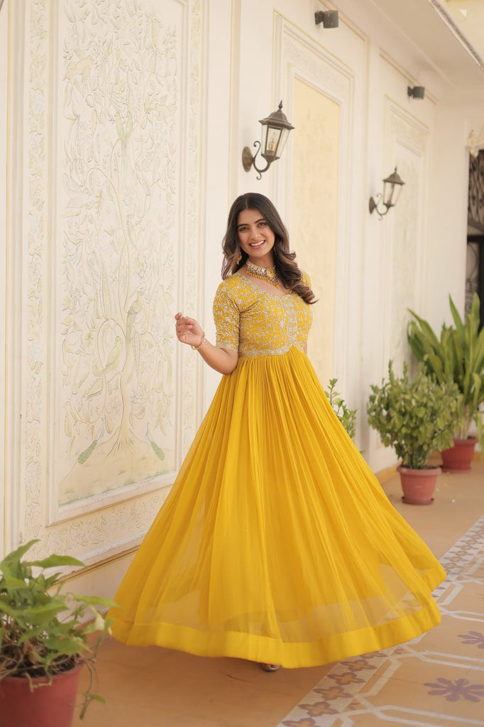 Luxurious Zari-Embroidered Yellow Gown for Discerning Women ClothsVilla