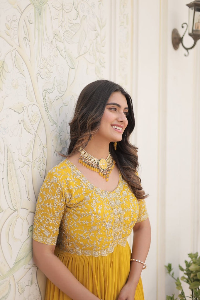 Luxurious Zari-Embroidered Yellow Gown for Discerning Women ClothsVilla