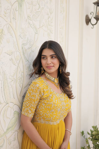 Luxurious Zari-Embroidered Yellow Gown for Discerning Women ClothsVilla
