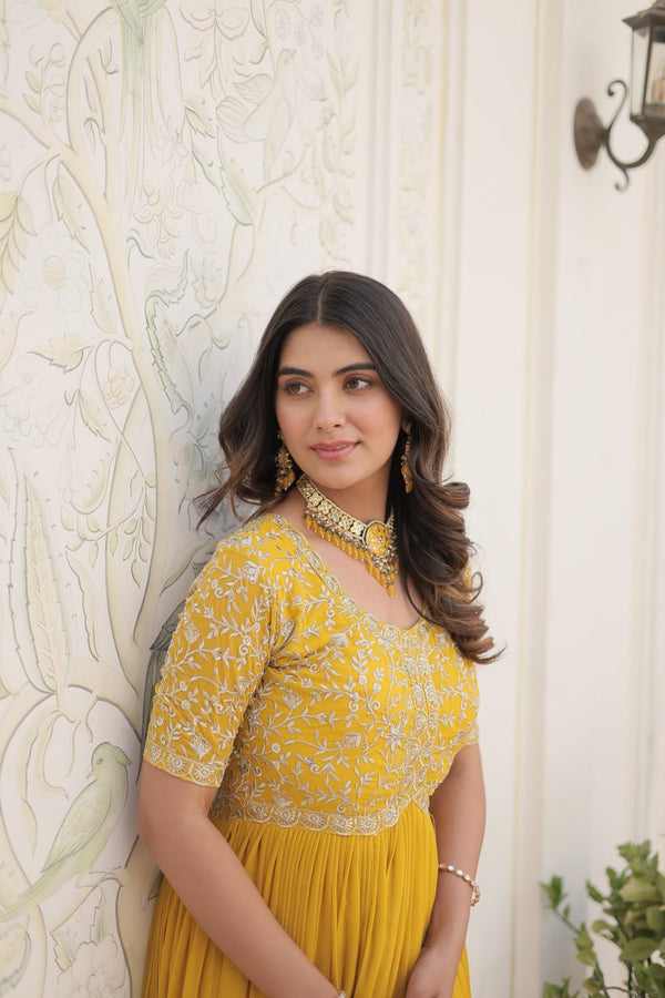 Luxurious Zari-Embroidered Yellow Gown for Discerning Women ClothsVilla