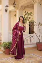 Load image into Gallery viewer, Embrace timeless elegance with our meticulously crafted Vichitra silk Magenta Pink gown and dupatta set. ClothsVilla