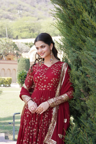 Embroidered Faux Blooming Georgette Flared Maroon Gown with Dupatta ClothsVilla
